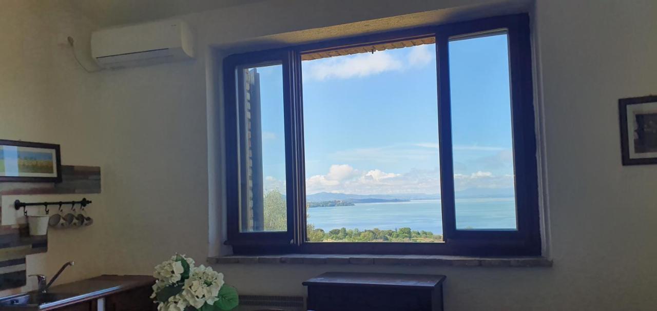 Aparthotel Poloturisticoumbria Rustico Con Piscina Vista Lago à Passignano sul Trasimeno Extérieur photo