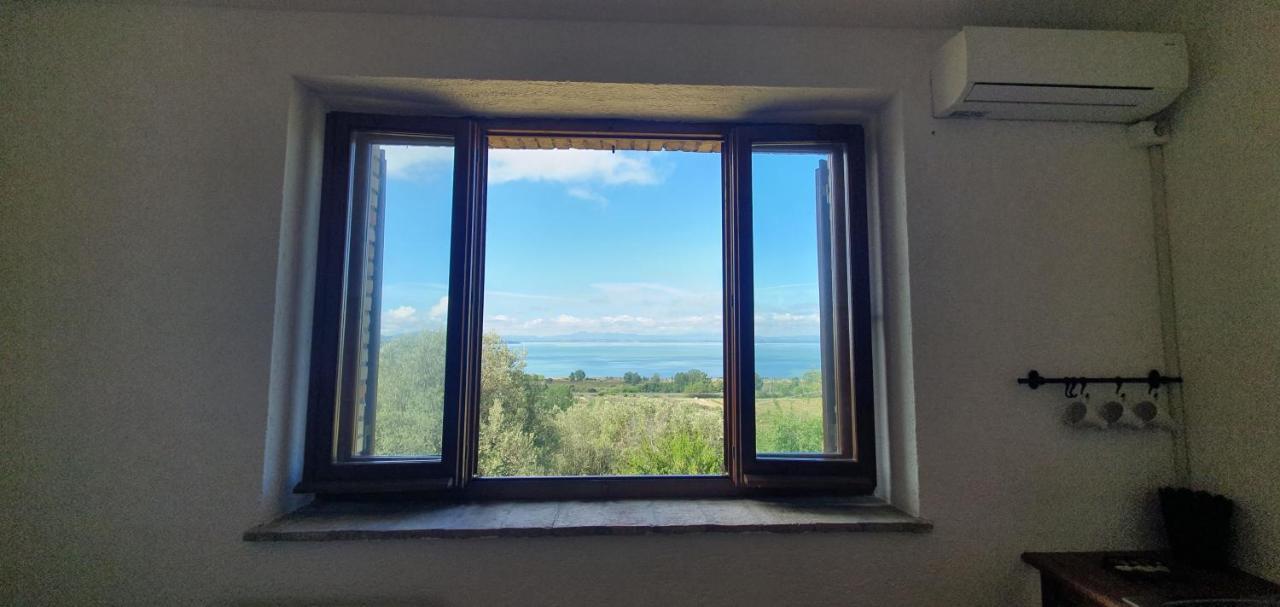 Aparthotel Poloturisticoumbria Rustico Con Piscina Vista Lago à Passignano sul Trasimeno Extérieur photo